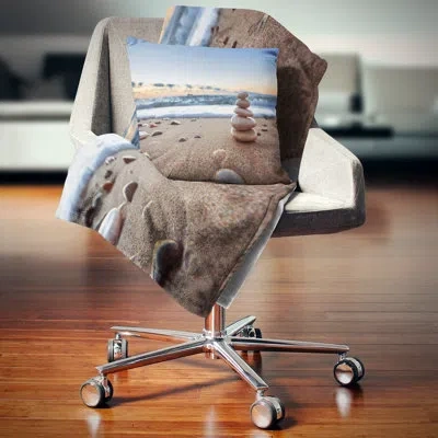 Design Art Stones Balance On Sandy Beach - Sea & Shore Printed Pillow In Brown