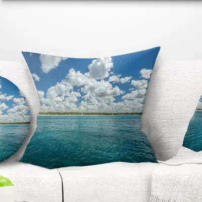 Design Art White Fluffy Clouds Over Sea - Sea & Shore Printed Pillow In Blue;white