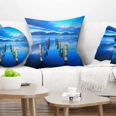 Design Art Wooden Pier Remains In Blue Sea - Sea & Shore Printed Pillow