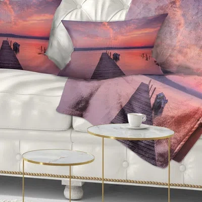 Design Art Wooden Pier Under Red Sky - Sea & Shore Printed Throw Pillow
