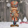 Designocracy Nutcracker With A Heartwarming Surprise Figurine In Multi
