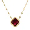 Designs By Gioelli 10k Yellow Gold Gemstone Clover Necklace In Red