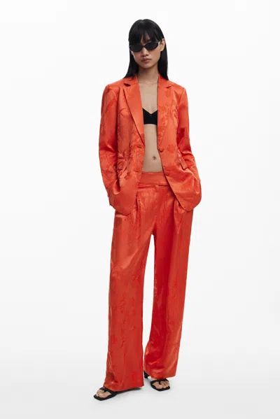Desigual 刺繍入り無地のロングパンツ In Orange