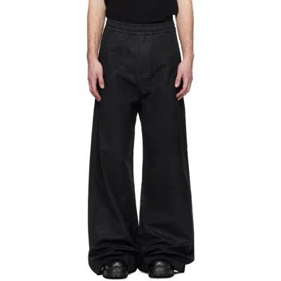 Det Blev Sent Black Waxed Elastic Trousers