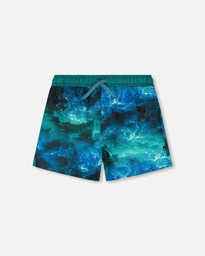 Deux Par Deux Kids'  Above The Knee Elastic Waist Dinosaur Waves Trunks In Multi