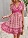 Devine Floral Smocked Waist Short Sleeve Mini Dress In Hot Pink In Pink
