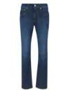 Devore Logo-patch Jeans In Blue