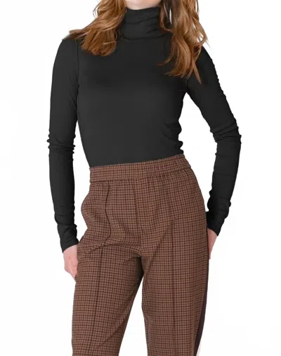 Dex Exposed Seam Turtleneck Top In Black