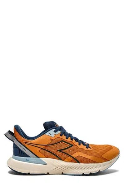 Diadora Mythos Blushield Volo 3 Running Shoe In Bright Marigold/blue Opal