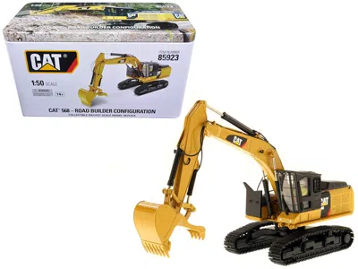 Diecast Masters Cat Caterpillar 568 Gf Road Builder With Operator "high Line Series" 1/50 Diecast Model By Diecast M