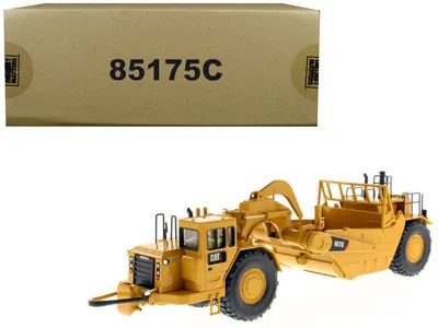 Diecast Masters Cat Caterpillar 657 G Wheel Tractor Scraper With Operator "core Classics Series" 1/50 Diecast Model  In Yellow