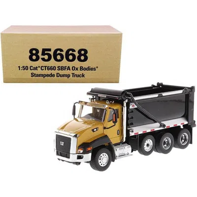Diecast Masters Cat Caterpillar Ct660 Sbfa With Ox Bodies Stampede Dump Truck Yellow & Black 1-50 Diecast Model Car