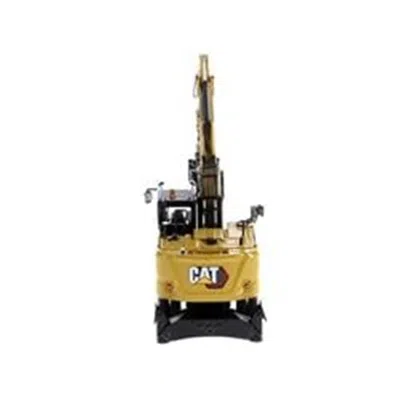 Diecast Masters Cat Caterpillar M318 Wheeled Yellow With Operator High Line Series 1 By 50 Scale Diecast Model Excav
