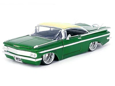 Diecast Model Jada 1959 Chevrolet Impala Lowrider Green Metallic With Cream Top And Dub Wire Wheels "street Low" Series