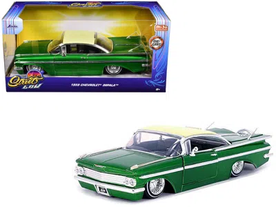 Diecast Model Jada 1959 Chevrolet Impala Lowrider Green Metallic With Cream Top And Wire Wheels "street Low" Series 1/2