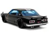 Diecast Model Jada 1971 Nissan Skyline Gt-r Rhd (right Hand Drive) Black With Silver Stripe And Mikey Diecast Figure "t