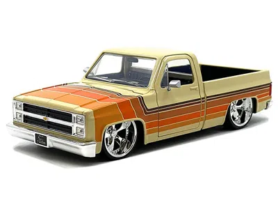 Diecast Model Jada 1985 Chevrolet C-10 Pickup Truck Beige With Stripes And Cartelli Wheels "just Trucks" Series 1/24 Di In Multi