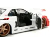 Diecast Model Jada 2002 Nissan Skyline Gt-r (r34) Rhd (right Hand Drive) White With Red Graphics And Ryu Diecast Figure