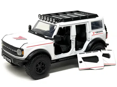Diecast Model Jada 2021 Ford Bronco White With Red Stripes And Roof Rack "yokohama Tires" "just Trucks" Series 1/24 Die