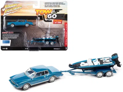 Diecast Model Johnny Lightning 1980 Chevrolet Monte Carlo Bright Blue Metallic With Blue Interior With Bass Boat And Trailer Limite