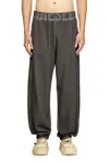Diesel Trousers With Printed Lateral Pockets And Elasticized Waist In Gray