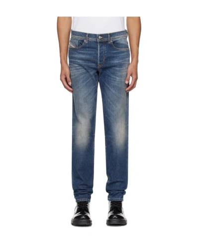 Diesel D-finitive Mid-rise Tapered Jeans In Blue