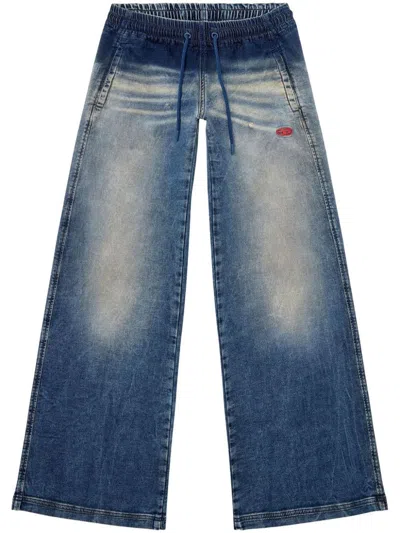 DIESEL DISTRESSED BLUE JEANS
