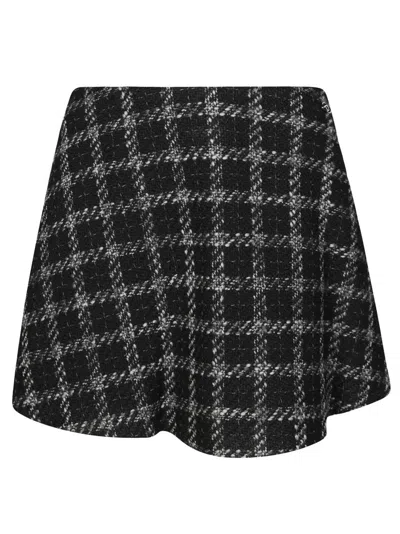 Diesel Knee-length Denim Skirt With Button Closure And Raw Hem In Black