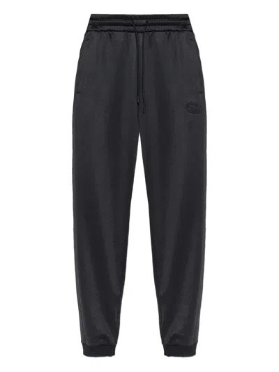 Diesel Logo-embroidered Track Pants In Black