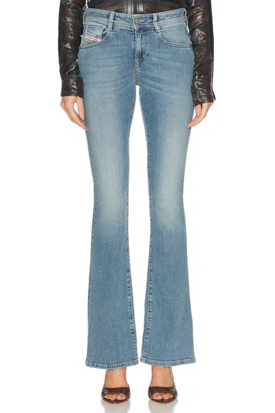 DIESEL LOW RISE BOOTCUT LEG JEANS