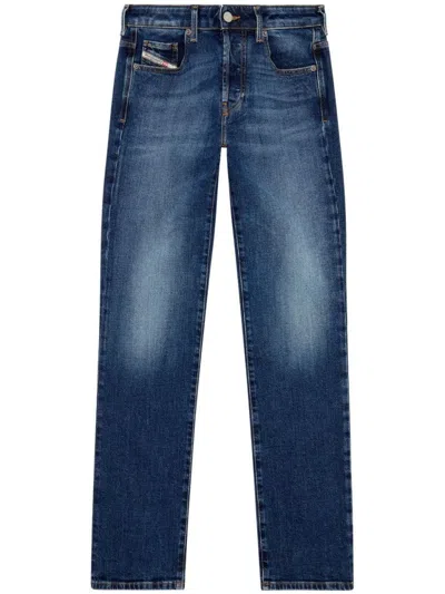 DIESEL MID-RISE STRAIGHT-LEG JEANS WITH FADED WASH AND WHISKERING