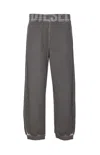 Diesel Trousers With Printed Lateral Pockets And Elasticized Waist In Gray