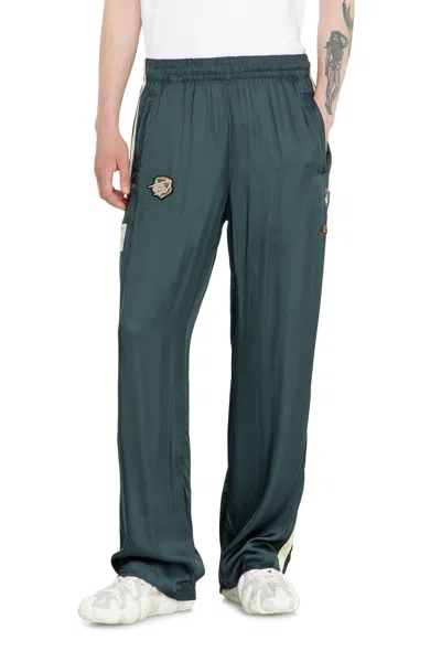 Diesel Track Pants With Tattoo Patches In Grey