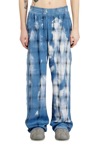 Diesel Track Pants With Check X-ray Effect In Blue
