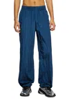 Diesel Track Pants With Distressed Piping In Blue