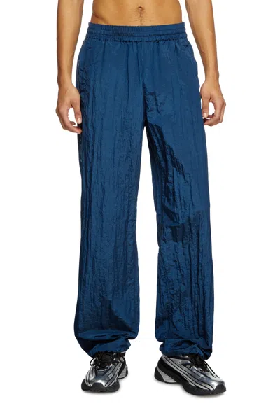 Diesel Track Pants With Distressed Piping In Blue