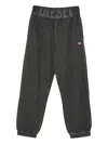 Diesel Trousers With Printed Lateral Pockets And Elasticized Waist In Gray