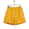 Diet Starts Monday Script Faux Leather Drawstring Shorts In Yellow