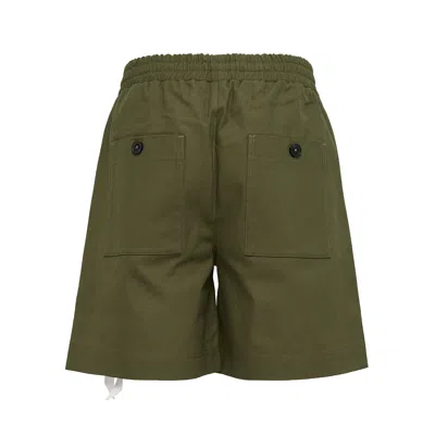 Diomene Daisy Shorts With Small Pockets In Green