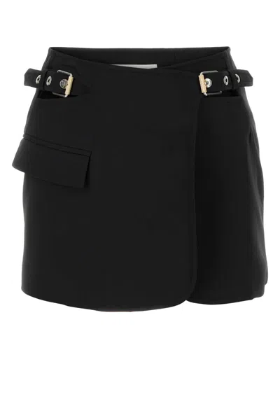 DION LEE DION LEE BLACK STRETCH POLYESTER BLEND MINI SKIRT