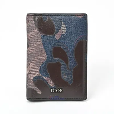 Dior -- Brown Leather Wallet  ()