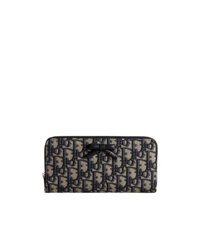 Dior Oblique Bow Voyageur Slim Wallet In Blue