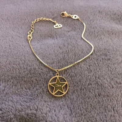 Pre-owned Dior Star Pendant And Chain Bracelet In Gold