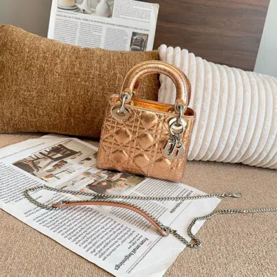 Dior Women Pre-loved Bag Very Good Condition In Gold