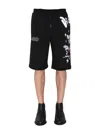 Disclaimer Graphic-print Bermuda Shorts In Black