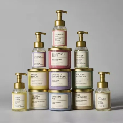 Distant Lands 14oz Lakeside Air 3-wick Scented Jar Candle In Gold