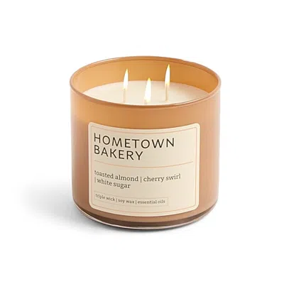 Distant Lands Scented Jar Candle In Hometown Bakery