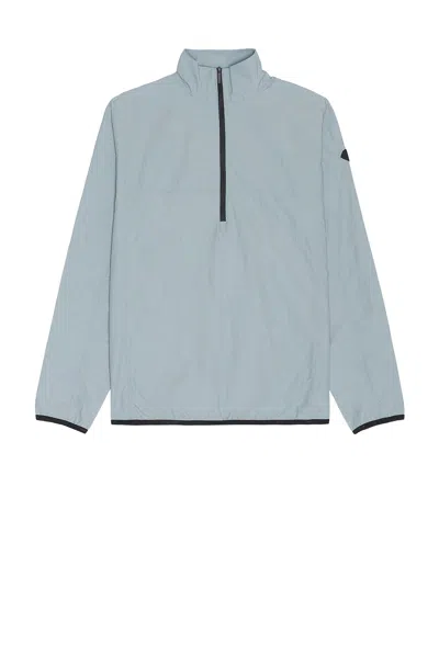 District Vision Dwr Recycled Half Zip Packable Shell In Pale Blue ...