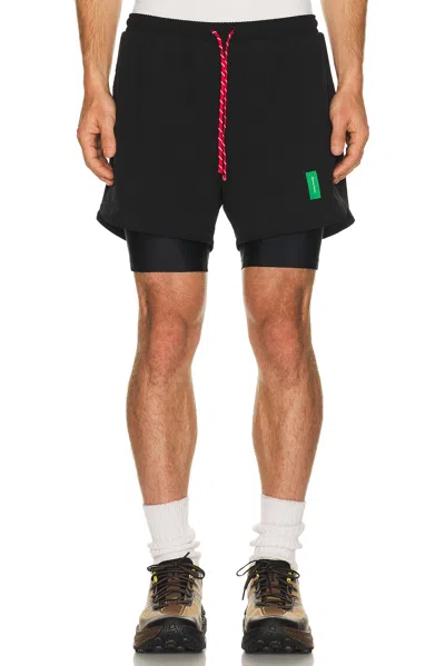DISTRICT VISION LAYERED TRAIL SHORTS