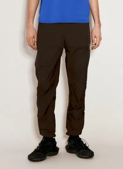 District Vision Ultralight Dwr Paneled Track Pants In Brown